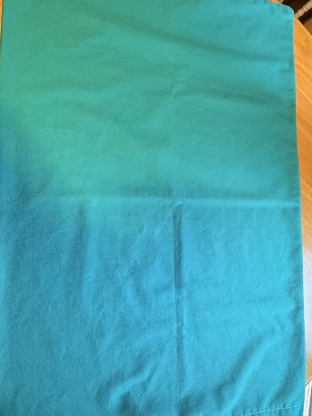 Teal drawstring laundry bag